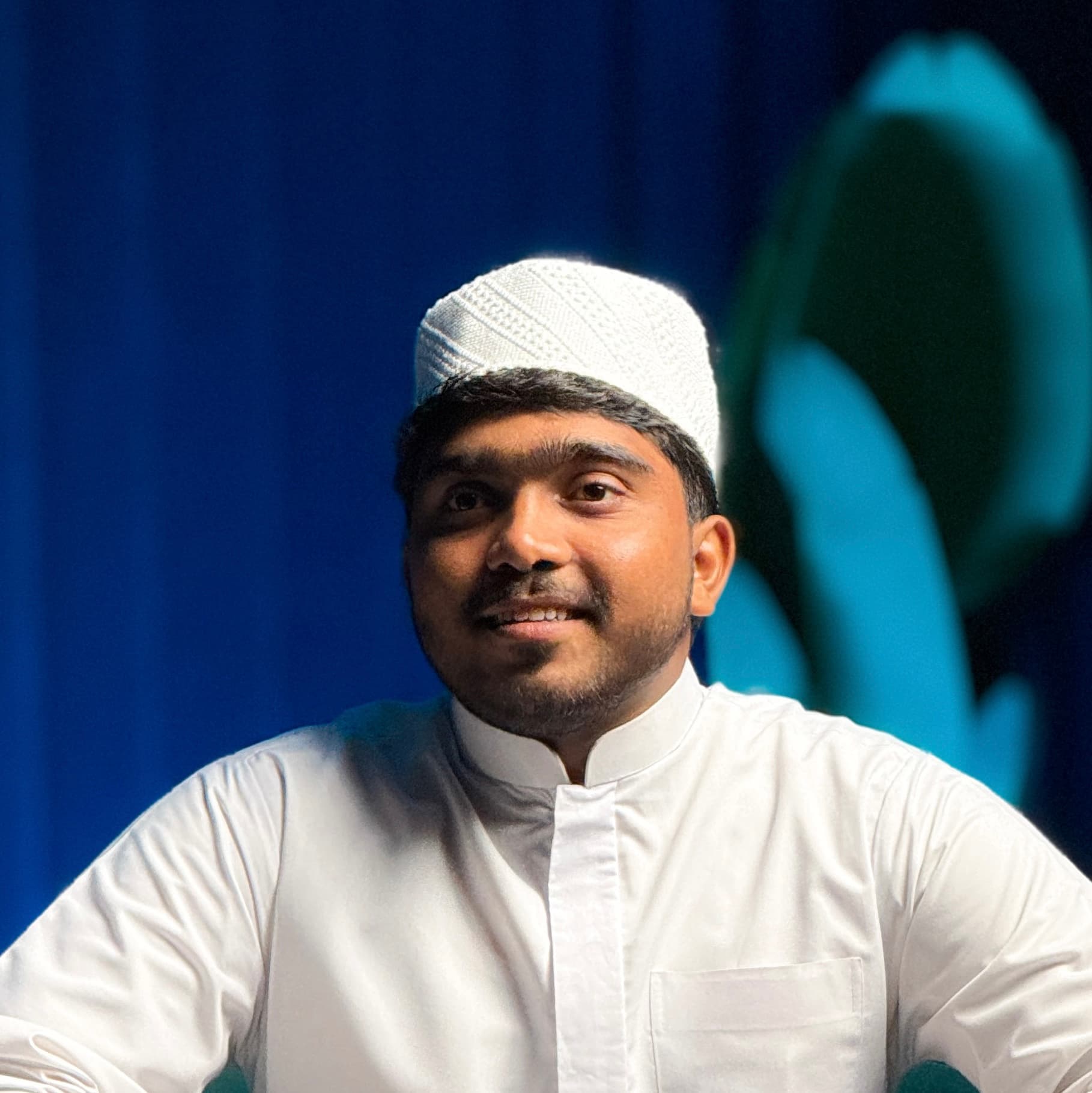 Thwaha Safwan front-facing portrait